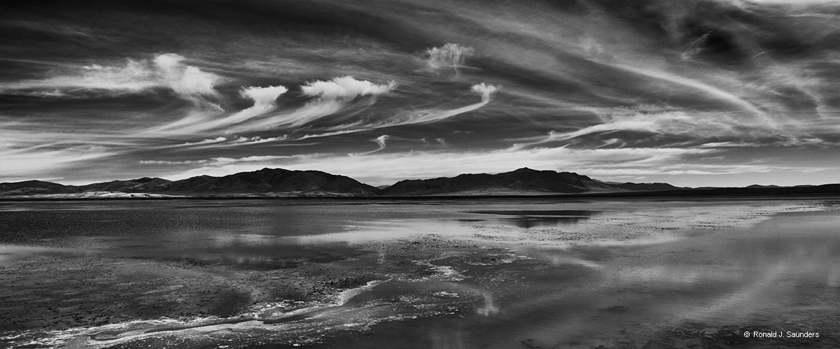 Wilson Reservoir is about an hour and a half’s drive north of Elko Nevada.   I see these cloud formations several times a...