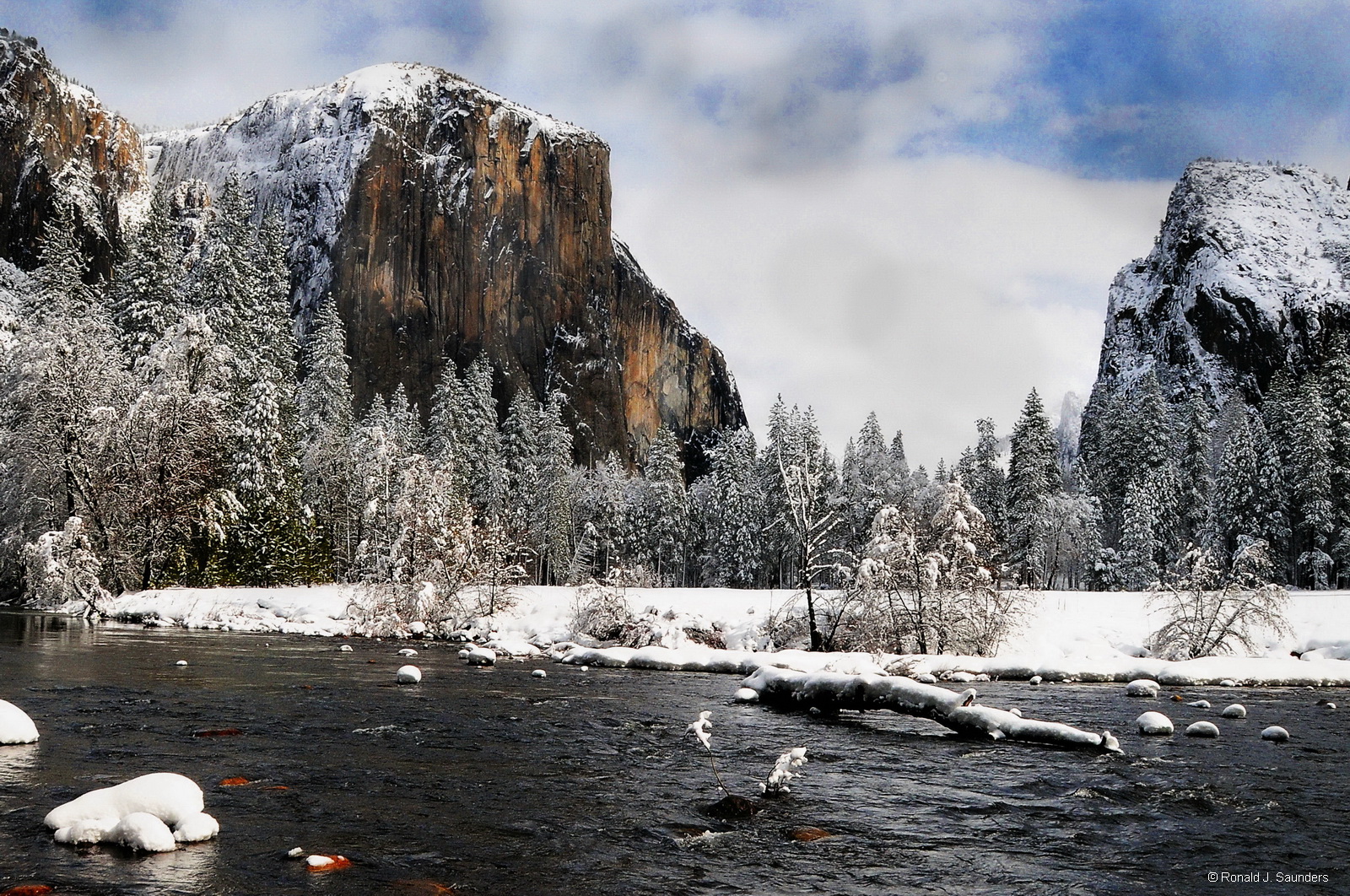 A cold and solemn day at Valley View from the edge of the Merced River.