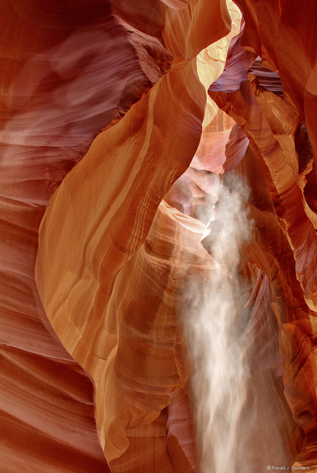 A late May beam of light enters Antelope Canyon.&nbsp; I have this print hanging in my family room.